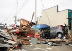 巨大津波で家屋ごと保険証券が流された人も多いと想定される。(PANA=写真)