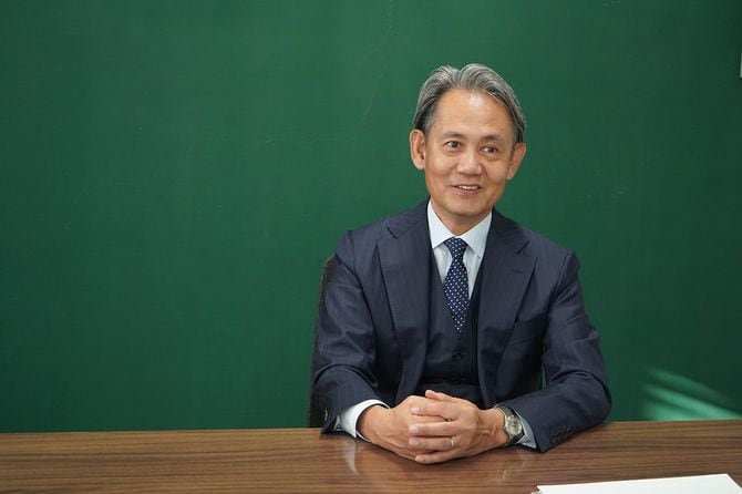 インタビューに応じる黒田さん