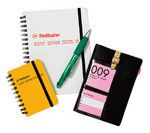 兼務多数のため神出鬼没。3冊の手帳とノートPCを抱えて、社内を動き回っている。ときには階下のコーヒー店で企画を練ることも。「場所を変えると、発想も変わりますから」。