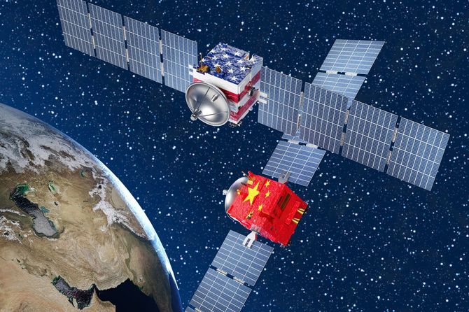 宇宙空間の米国と中国の衛星がニアミスしているイメージ画像