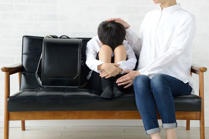 母親に励まされた子供