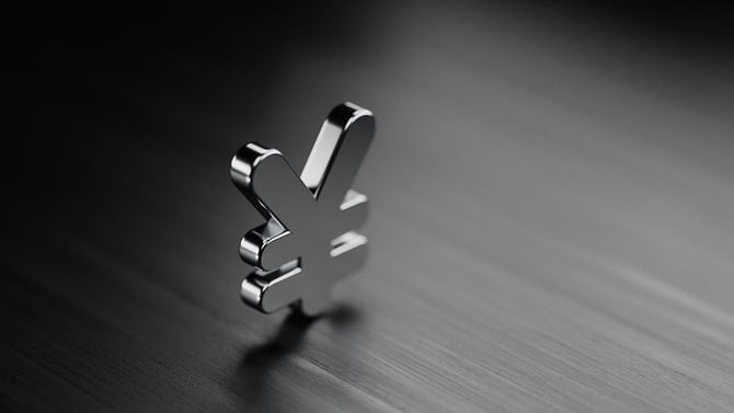 黒いテーブルの上に円記号