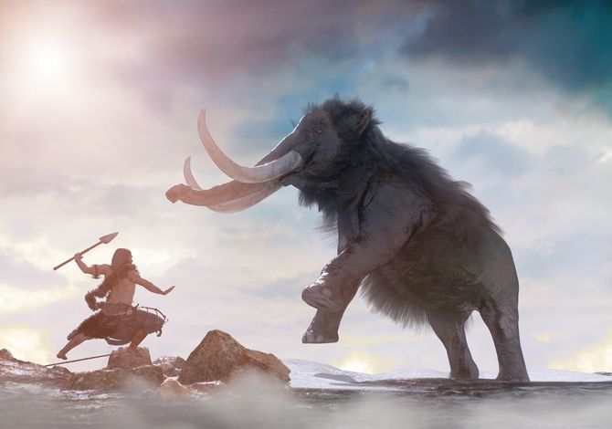 狩猟時代にマンモスに挑む人間のイメージ