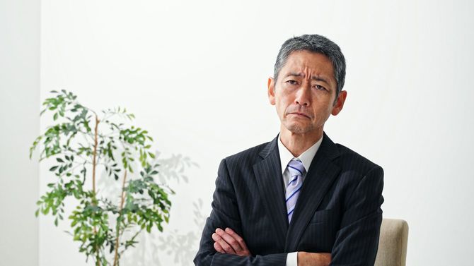 不満を抱えた中年ビジネスマン
