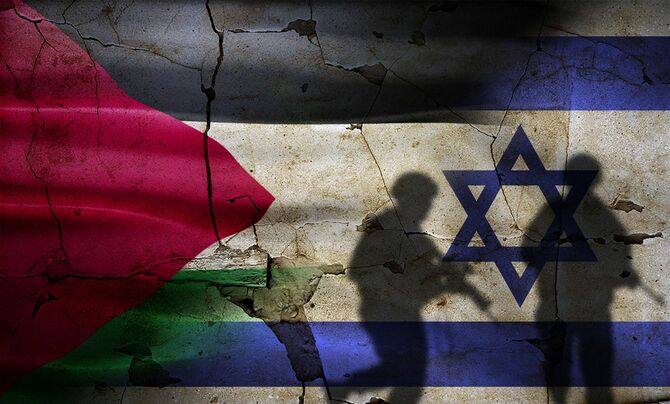 ひびの入った壁にイスラエル対パレスチナの旗