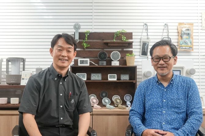 左がリズム株式会社 商品開発部 藤井秀紀さん、右が営業本部 販売企画部 横田健英さん