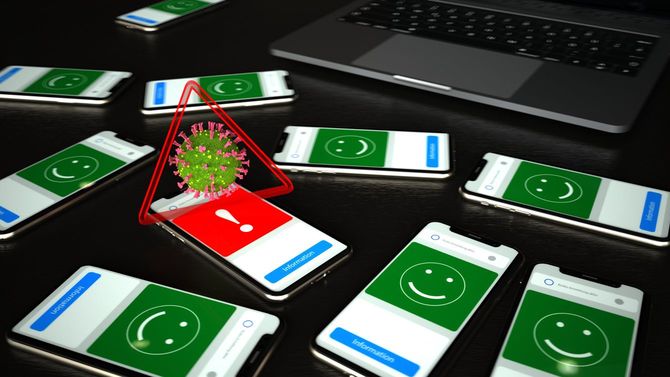 感染を知らせるスマートフォン