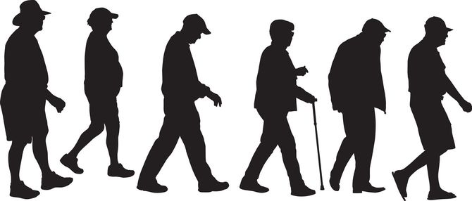 高齢者が歩くシルエット