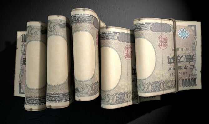 ゴムでまとめられた1万円札の札束