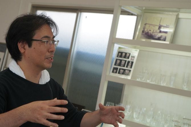 当時の様子を語る田嶌社長。