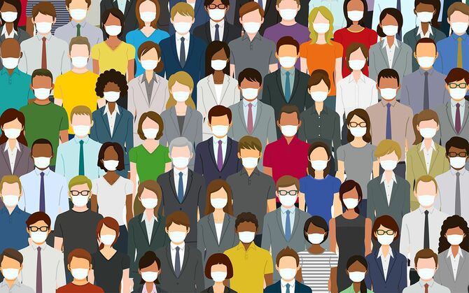 フェイスマスクを着用した大勢の人々