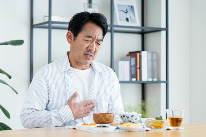 食欲不振の中年男性