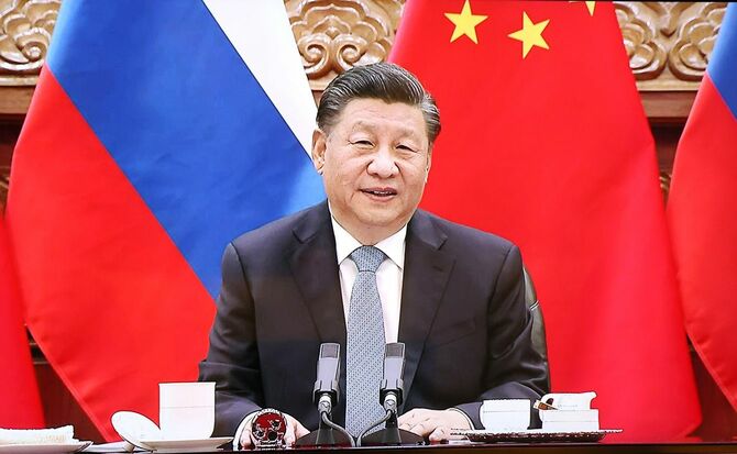 2021年12月15日、ロシア・モスクワで行われたロシアのウラジーミル・プーチン大統領とのテレビ会議での中国の習近平国家主席（KREMLIN PRESS OFFICE／配布資料）
