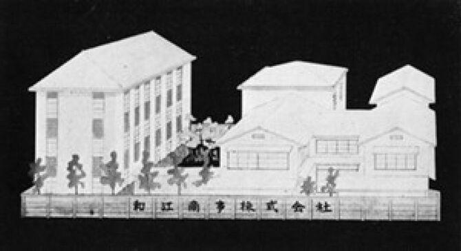 昭和26年（1951）7月に移転した室町本社と工場のイラスト。左の洋館が工場