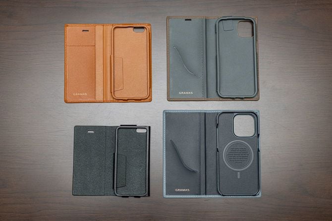 GRAMASの歴代商品。左下から時計周りに、日本初の一枚革で作られたiPhone 5ケース（2012）、初めて上代が1万円を超えたiPhone 6ケース（2014）、iPhone 13 Proケース（2021）、最新の iPhone 14 Proケース（2022）。