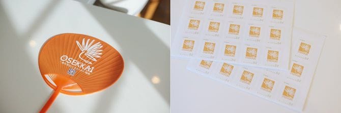 うちわやカレンダー、切手まで……仲間の発案でおせっかいグッズが増えてきた