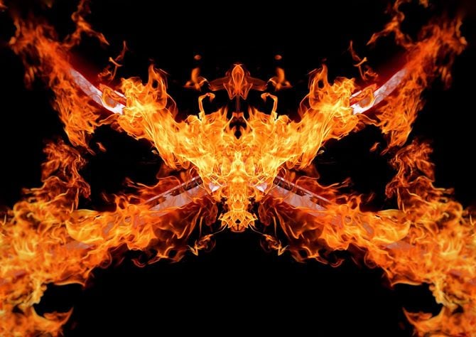 暗闇で交差する炎の剣のイラスト