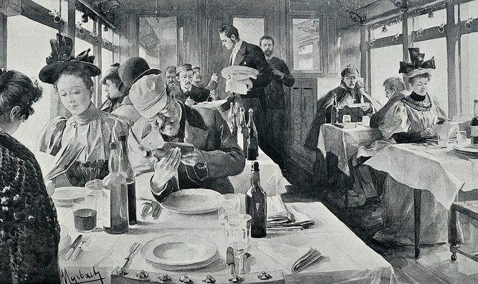 オリエント急行の食堂車で、夕食を楽しむ人々