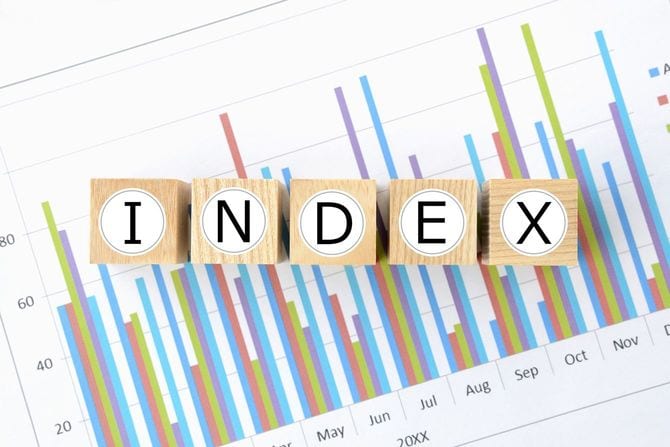 ビジネスチャートと「INDEX」の単語が書かれた木製ブロック