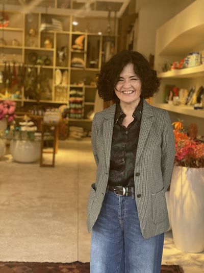 異国情緒あふれる土地柄を表現したフードマーケットやホテル風のインテリア雑貨をそろえた店など新しい展開を進めるプラザハウスの平良由乃社長＝沖縄市・プラザハウス