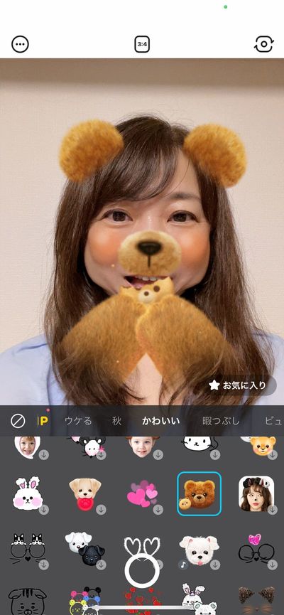 自撮りアプリでは口を開けるとクッキーを食べる加工も流行