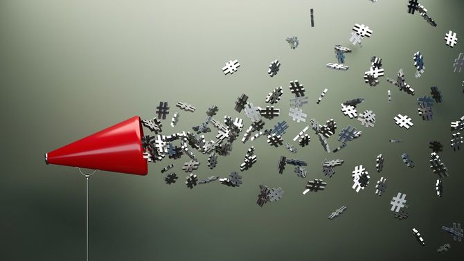 赤いメガホンから無数のハッシュタグが吐き出されている