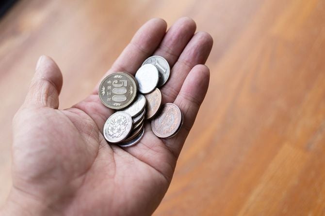 コインを持っている