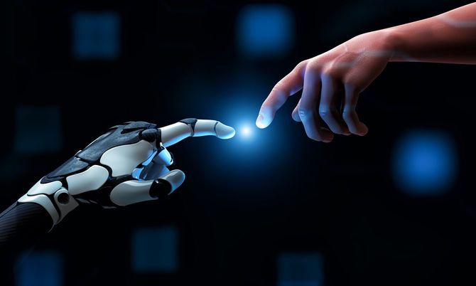 ロボットの手が人間の指と接触する場面