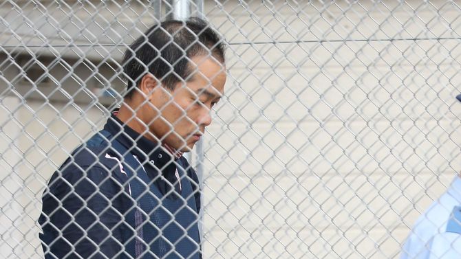 送検される宮崎文夫容疑者