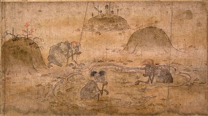 奥に傘塔婆と思しき墓がみえる