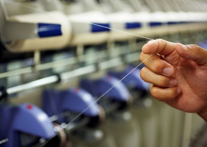 残された最新の設備と複合撚糸の技術に賭けた