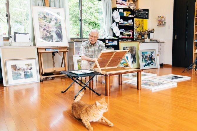 愛猫のマロンちゃんと。ある日庭に迷い込んできてから、柴崎家の子となった。