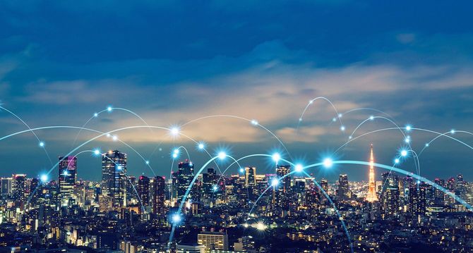 スマートシティと通信ネットワークのイメージ
