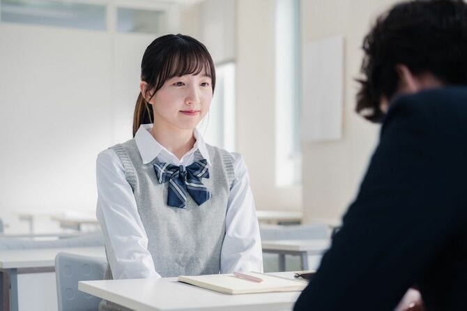 先生と対談する女子高生