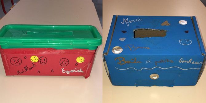 道徳の時間に作った「問題箱」（左）と「いいこと箱」（右）