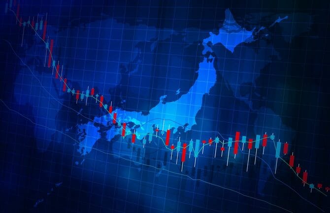 株価下落グラフと日本地図