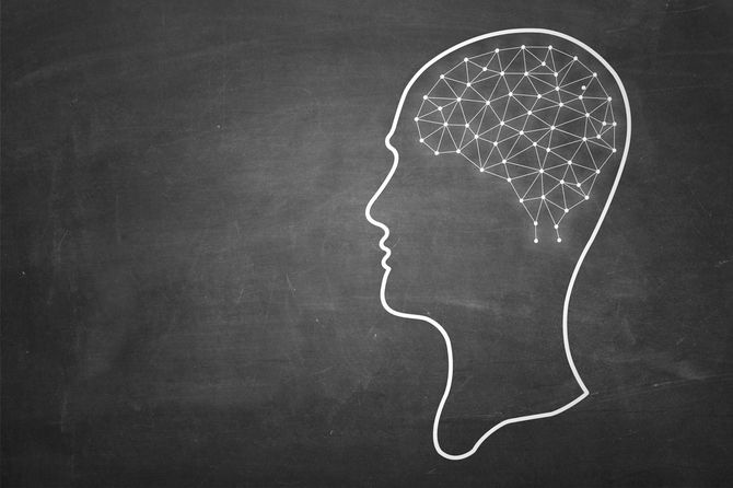 黒板に描かれたAIのイメージ