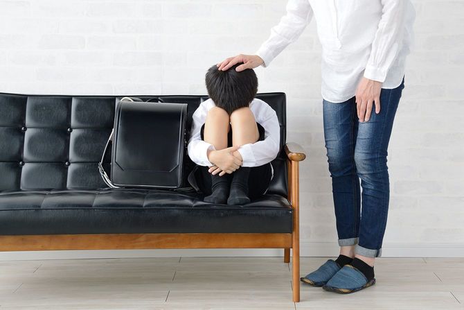 母親に励まされた子供