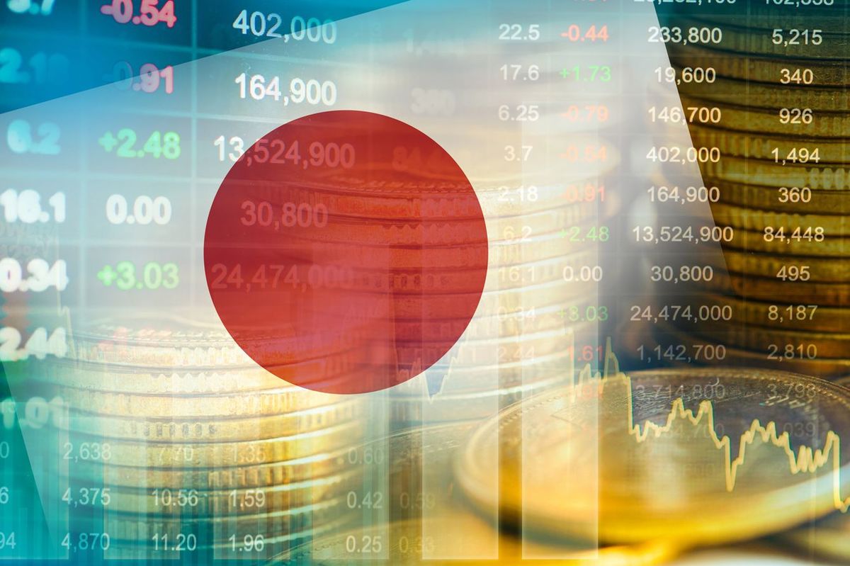 株価、経済動向グラフと日本の国旗