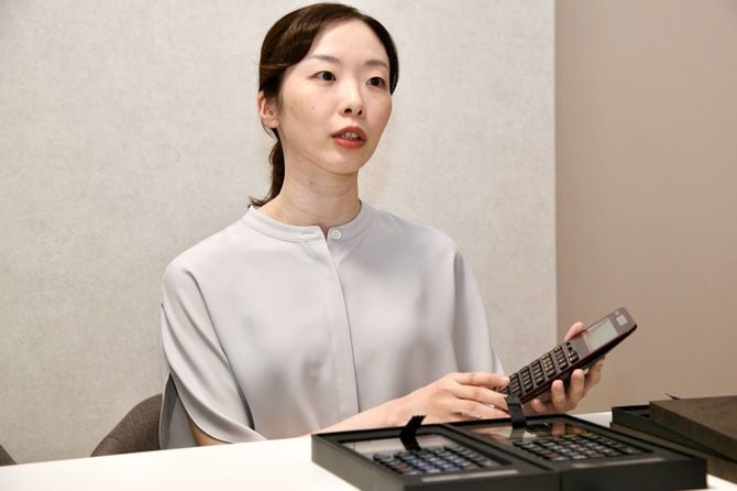 漆電卓の商品企画を担当した野村美月さん