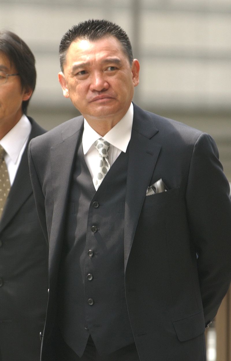 判決公判で東京地裁に入る恐喝未遂罪に問われた萩原健一被告