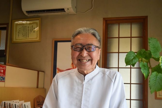 インタビューを受ける野呂さん