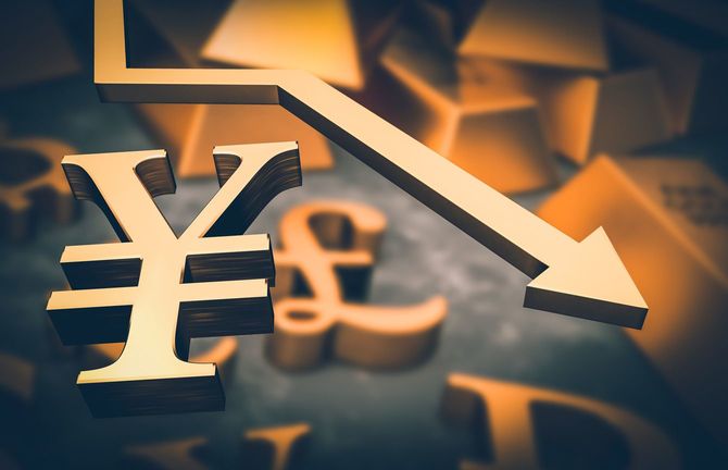 円マークと下降していく矢印のイメージ