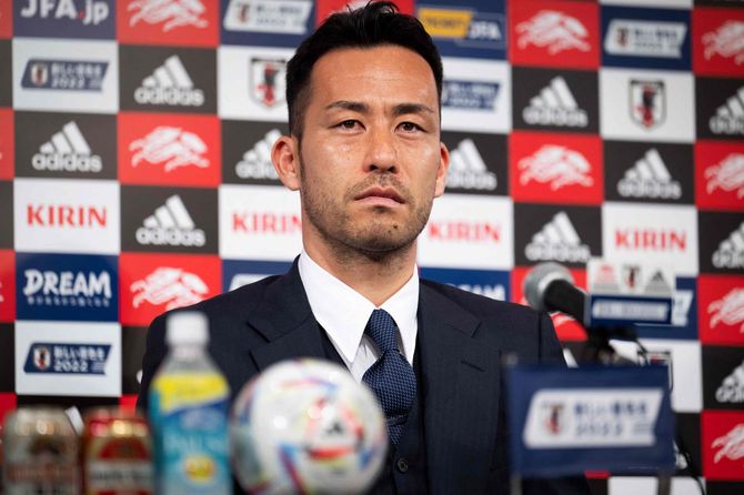 W杯カタール大会から帰国し、記者会見するDF吉田麻也選手（＝2022年12月7日、千葉県成田市）