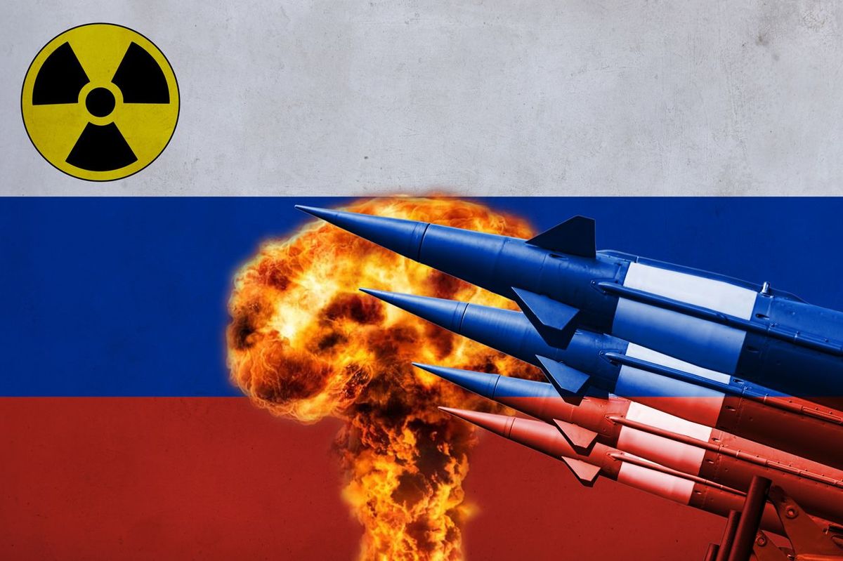 ロシア国旗を背景に浮かぶロケット弾