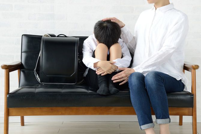 母親に励まされた子供