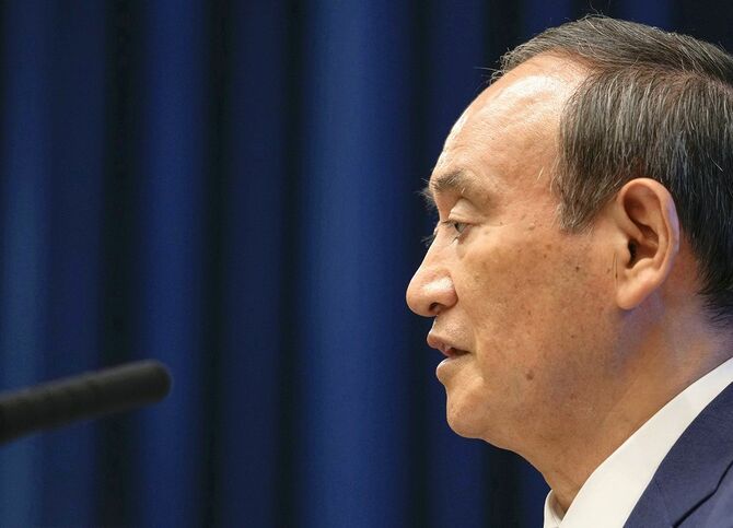 緊急事態宣言とまん延防止等重点措置の全面解除について記者会見する菅義偉首相＝2021年9月28日、首相官邸［代表撮影］