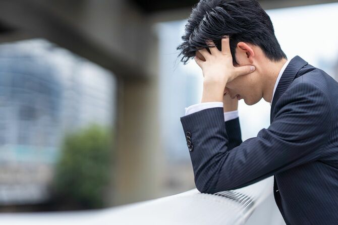 問題を抱えたビジネスマン